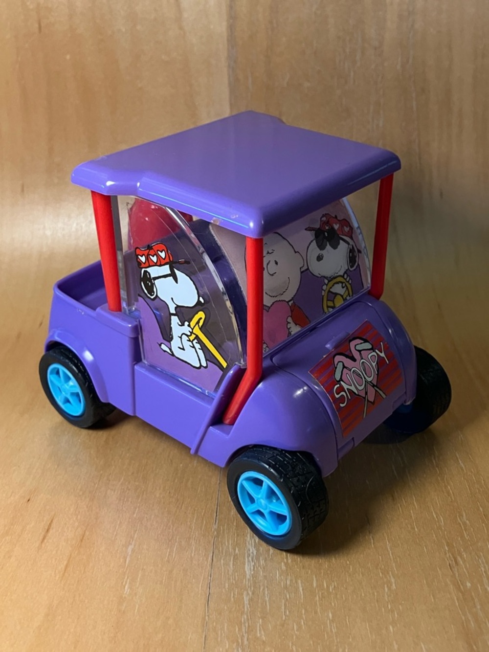 Peanuts Purple Treat Dispensing Toy Golf Cart by Galerie au Chocolat
